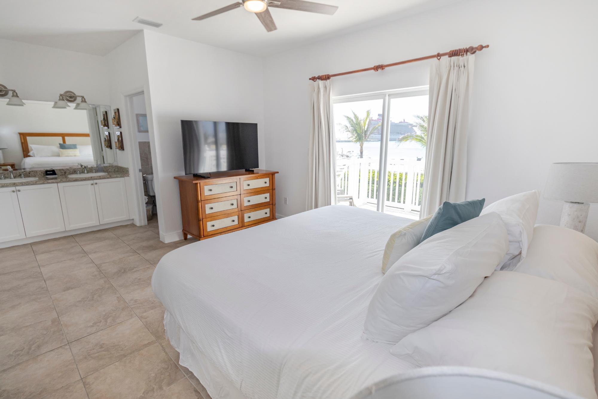 Master bedroom with a king bed